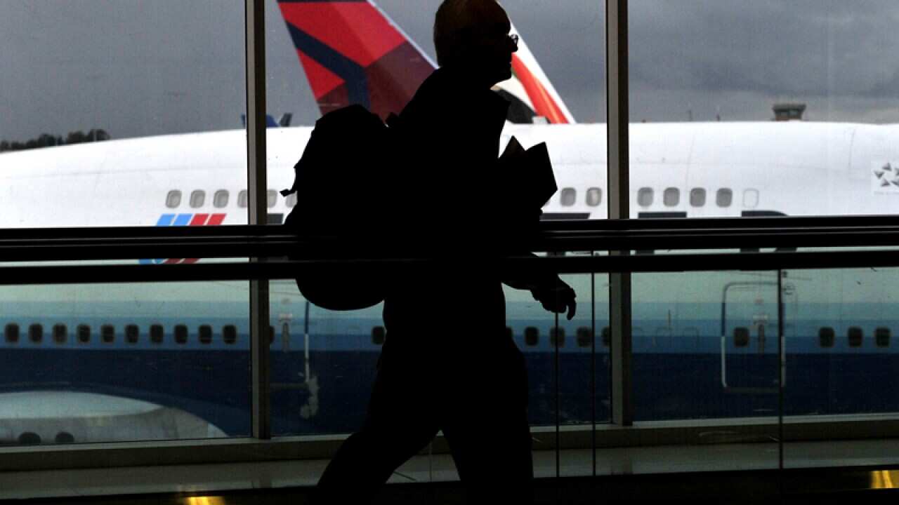 Tourists at the international airport in Sydney