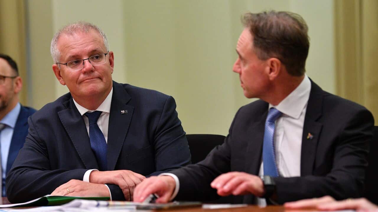 Prime Minister Scott Morrison (L) and Health Minister Greg Hunt at a GP roundtable in Melbourne