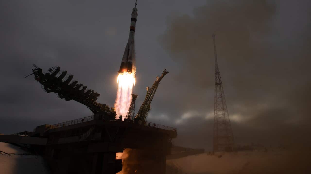 A Russian Soyuz spacecraft blasts off, heading for the International Space Station