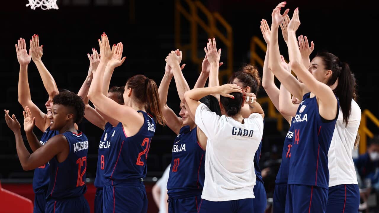 epa09393078 Players of Serbia celebrate after they defeated China team after the Women's Basketball quarterfinal match between China and Serbia at the Tokyo 2020 Olympic Games at the Saitama Super Arena in Saitama, Japan, 04 August 2021. EPA/WU HONG