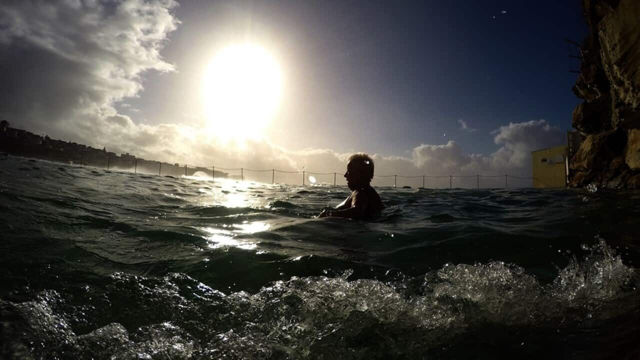 A swimmer takes to the water at Bronte Baths in Sydney