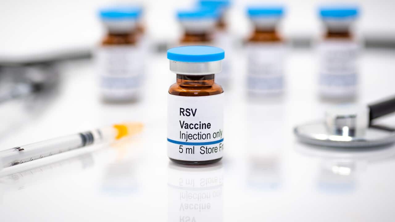 Respiratory syncytial virus RSV vaccine vial with syringe and stethoscope