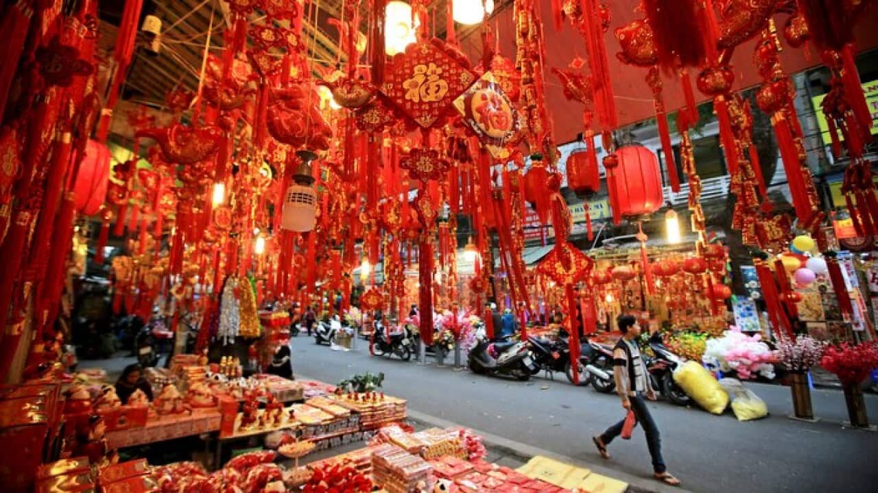 Preparing to celebrate Tet, or Lunar New Year, in Hanoi, Vietnam.
