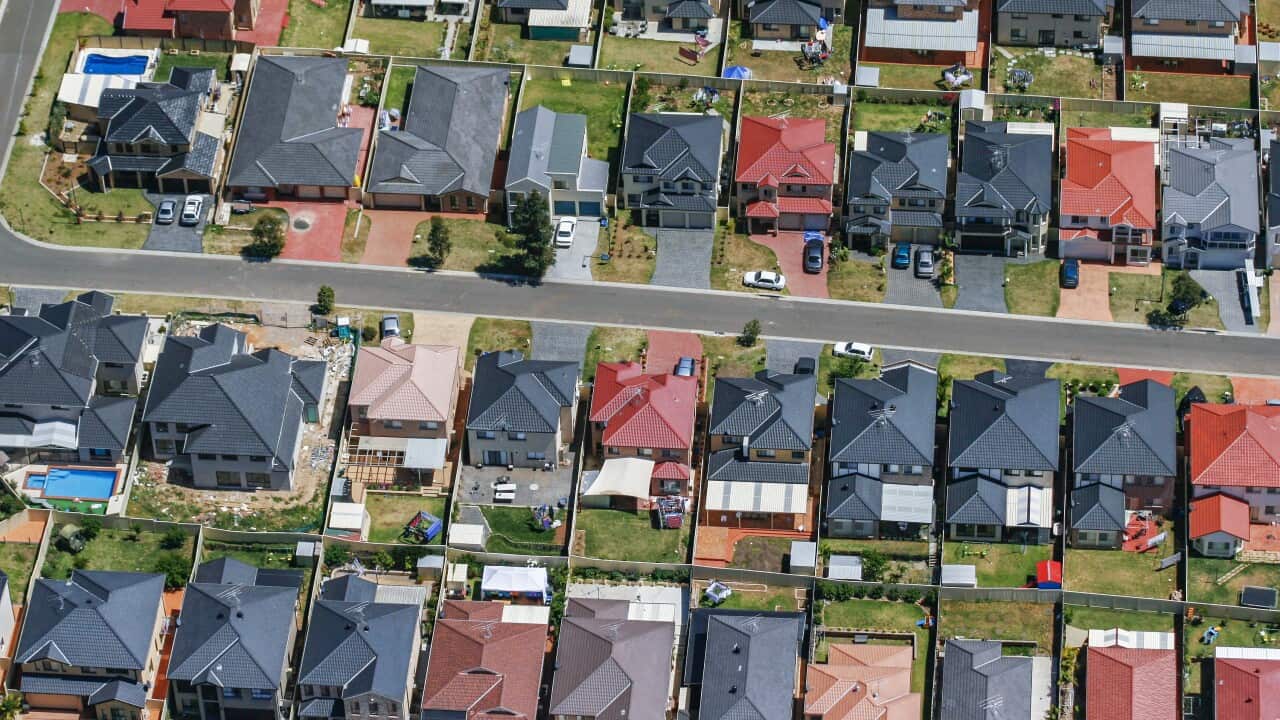 Houses, streets, suburb on edge of city, urban sprawl in Sydney, Australia, aerial photography