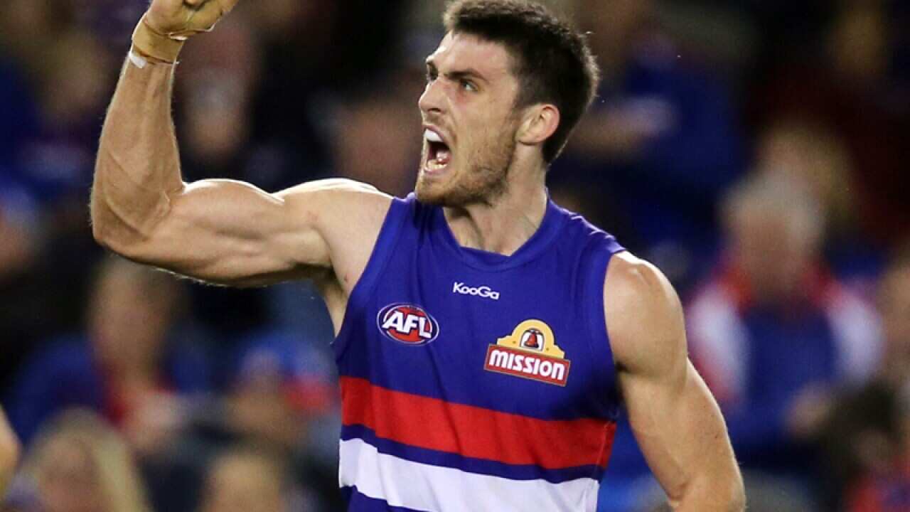 Dickson six as Bulldogs down Crows in AFL
