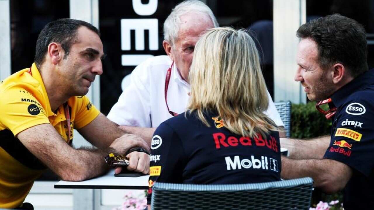 Some tense exchanges: Cyril Abiteboul (left) and Christian Horner