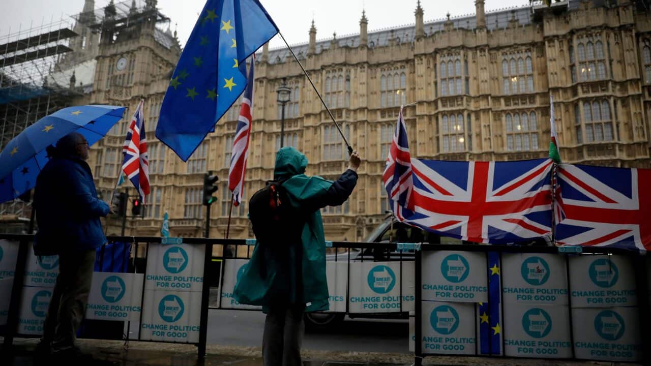 Anti-Brexit remain in the European Union supporters protest outside the Houses of Parliament in London.