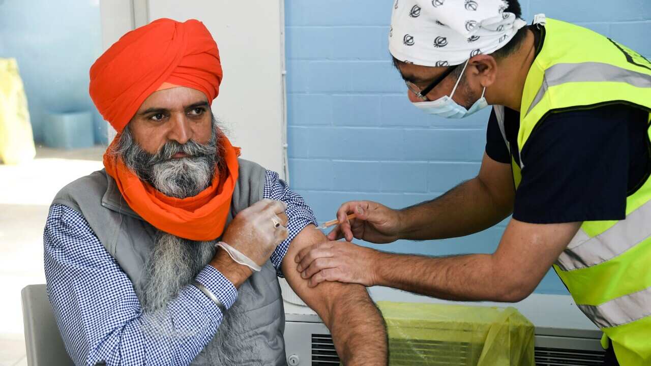 Vaccine is administered at the Guru Nanak Gurdwara Sikh temple in Luton, UK