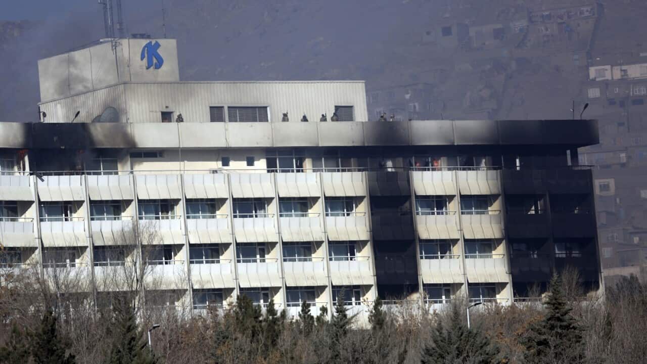 Afghan security personnel are seen at the roof of Intercontinental Hotel after an attack in Kabul, Afghanistan, 21 January, 2018.