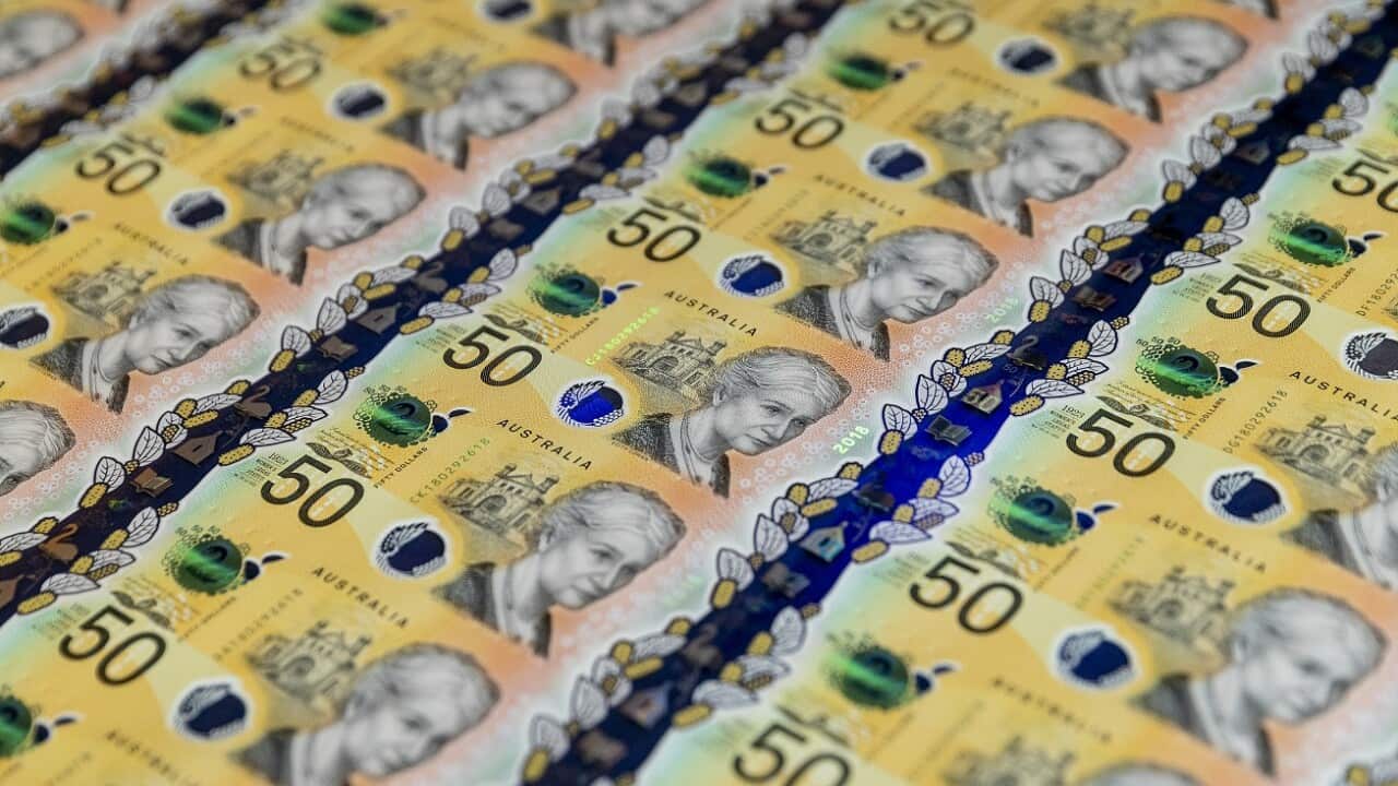 The new fifty dollar banknote is revealed at Vision Australia in Melbourne, Monday, October 8, 2018. (AAP Image/Daniel Pockett) NO ARCHIVING