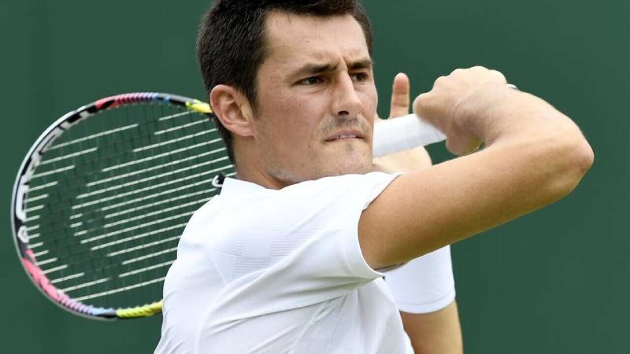 Bernard Tomic of Australia in action