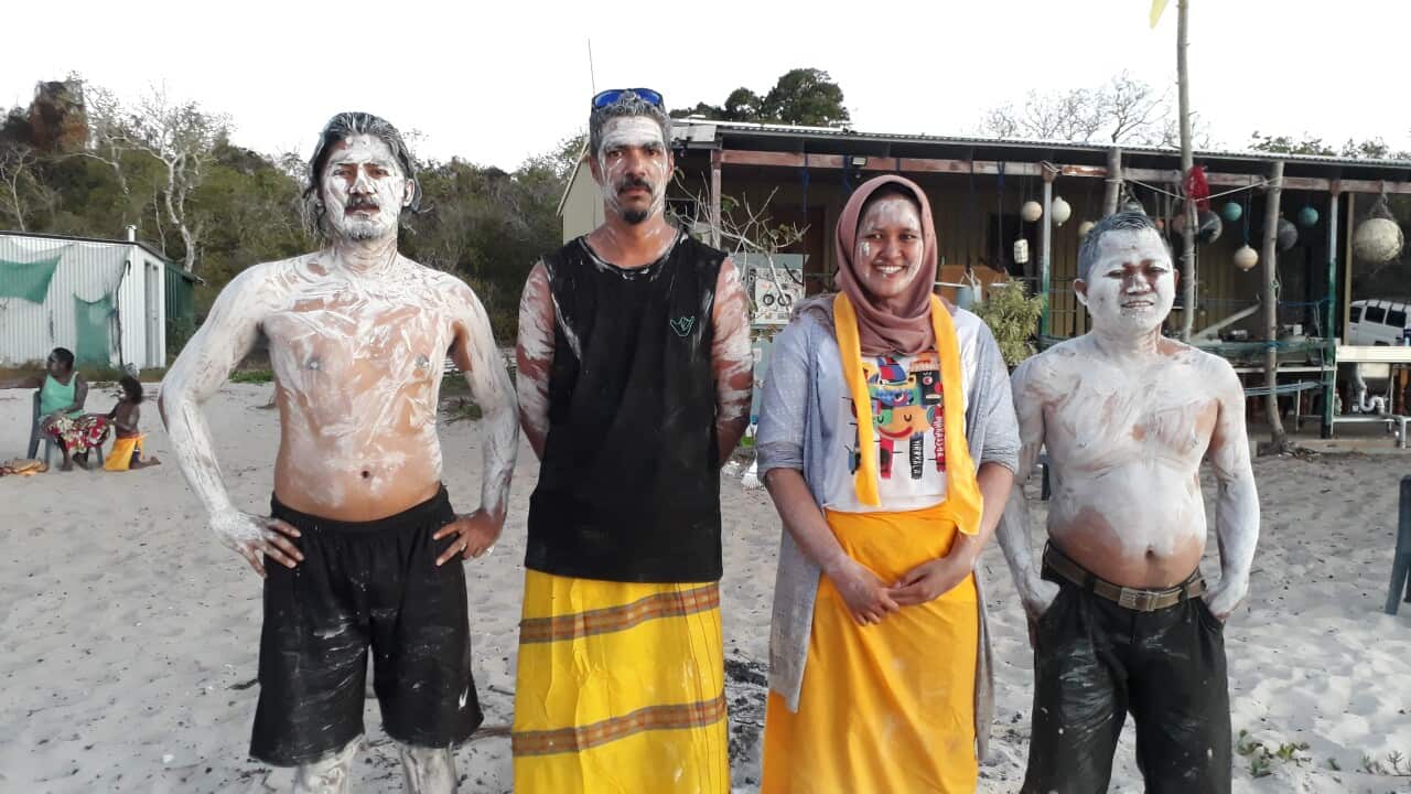 Three Yolŋu artists from East Arnhem Land and some Makassan atists involved in an exchange program to retrace the sea-faring trade relationships of their ancestors, Dec 2018.