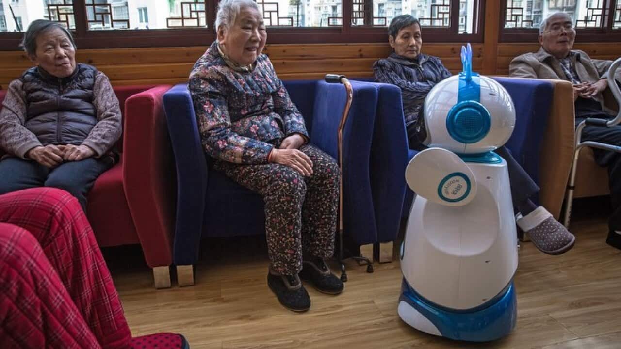 A nursing home in East China's Zhejiang province uses robots to help nursing staff