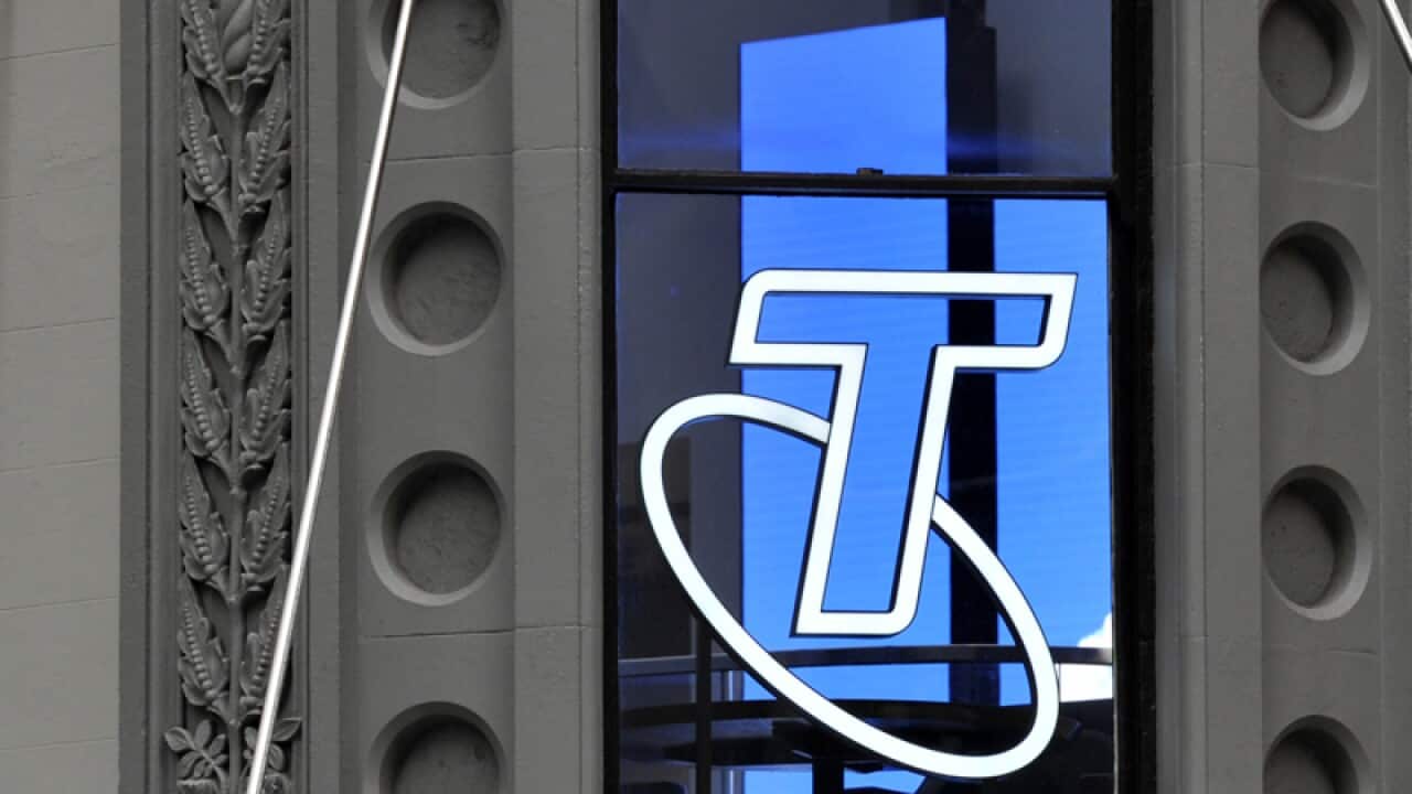 A Telstra sign in a window