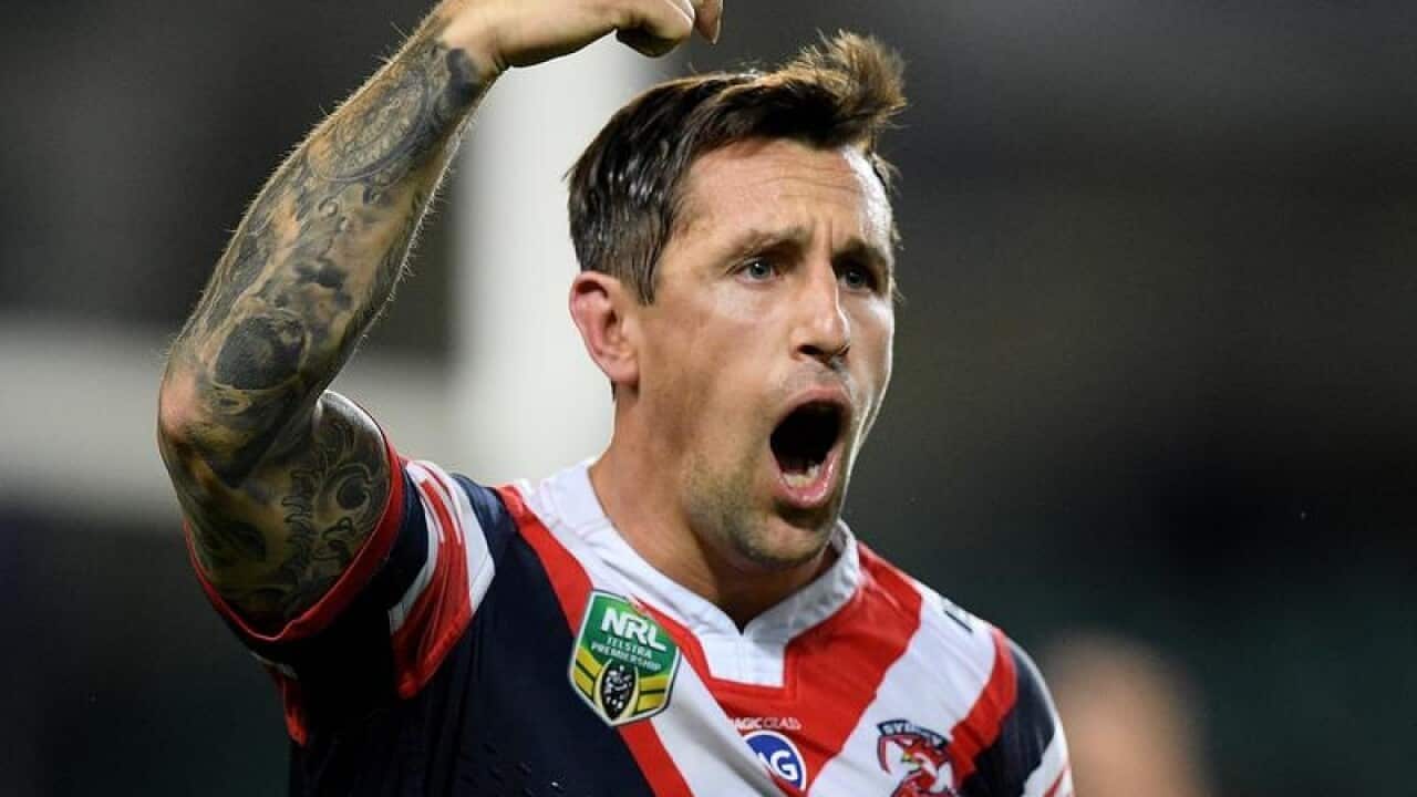 Mitchell Pearce of the Roosters makes a gesture
