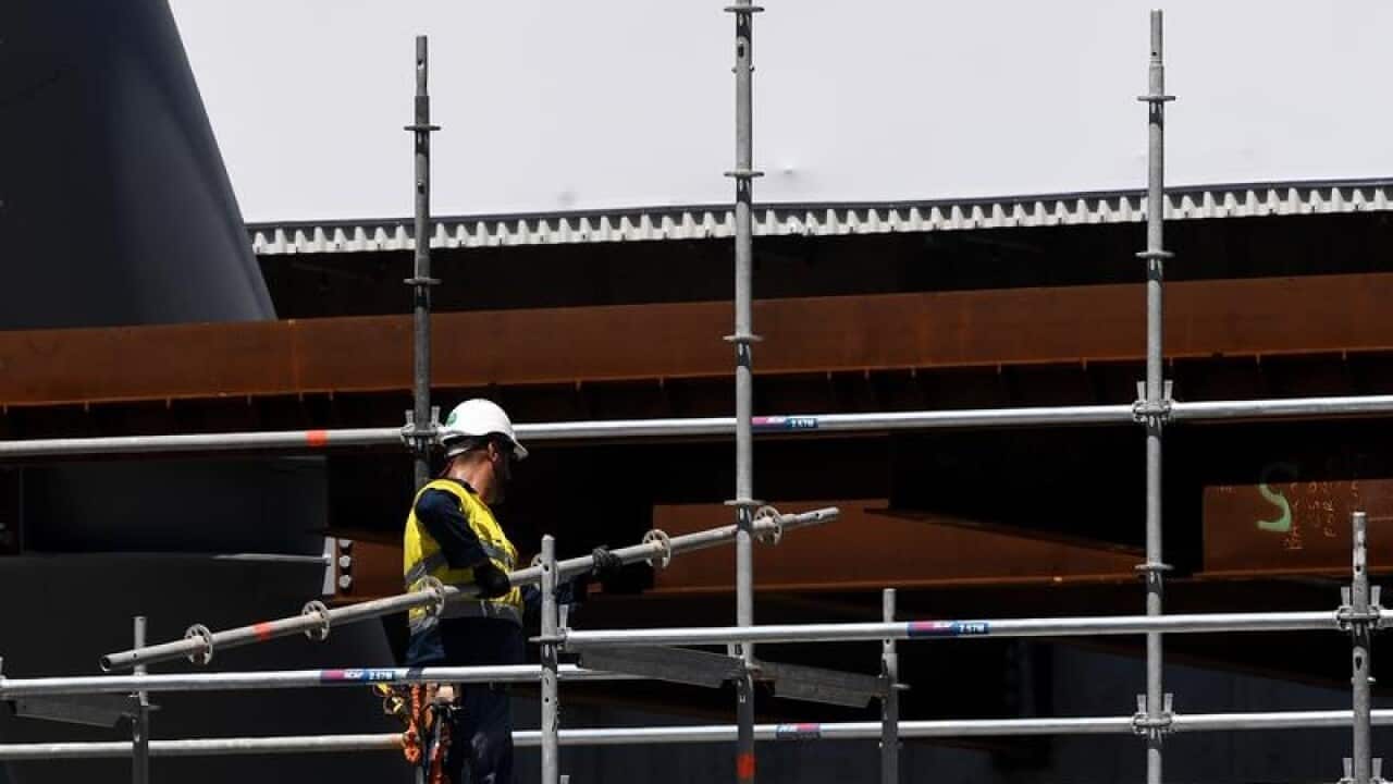 Worker on building site.