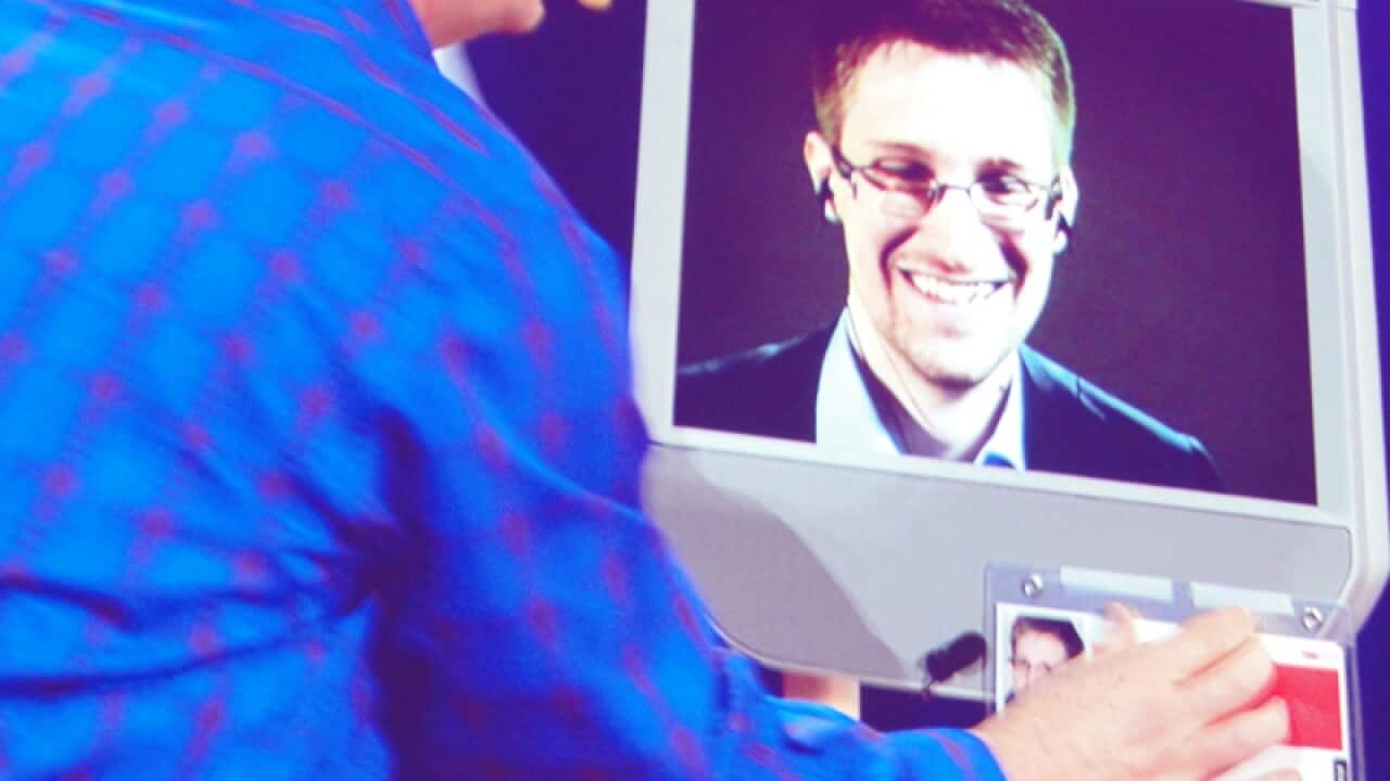 Edward Snowden appears on a computer screen