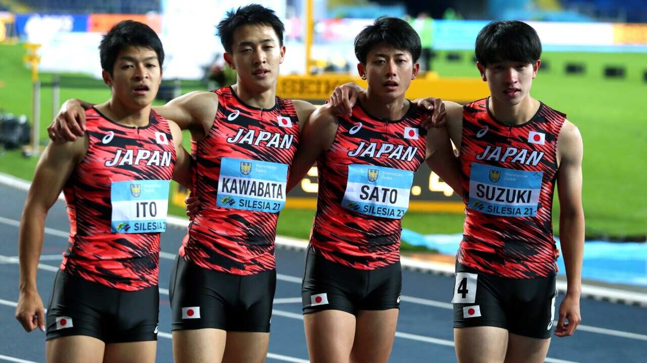 Members of the Japanese relay team react after competing in the men's 4x400m Relay final of the World Athletics Relays Championships at the Silesian Stadium in Chorzow, southern Poland, 02 May 2021.