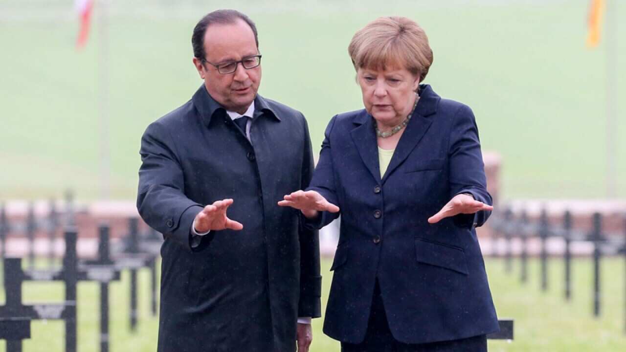 Angela Merkel (R) and Francois Hollande