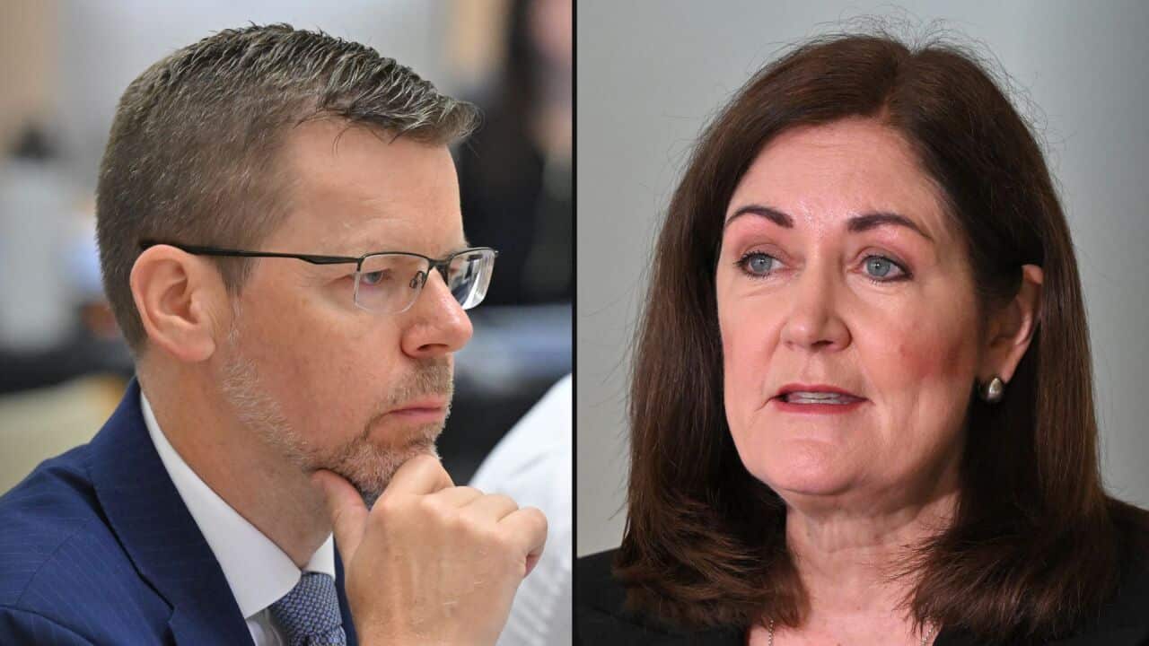 A composite of a man in a blue suit and tie alongside a woman wearing a black blazer.