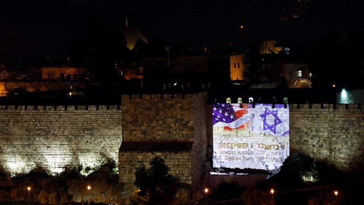 US and Israeli flags projected on the wall of Jerusalem’s Old City