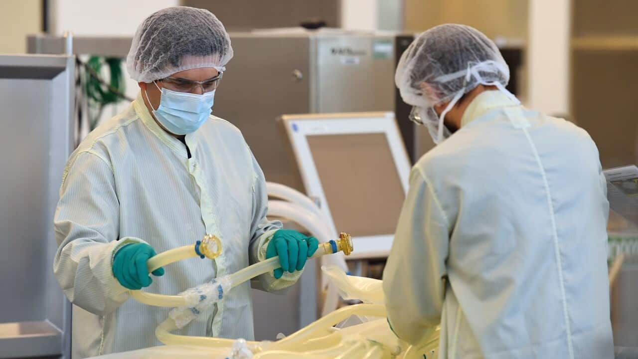Scientists are seen at work inside of the CSL Biotech facility in Melbourne.