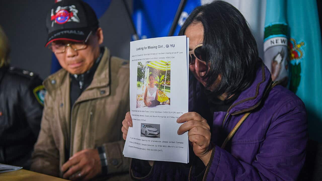 Parents of missing woman Qi Yu, Qing He (right) and Zhihe Yu (left) are seen during a police press conference in Sydney, Tuesday, June 26, 2018. 