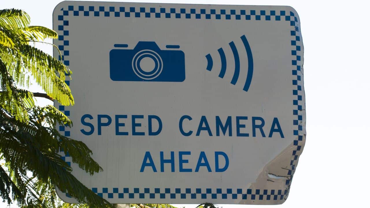 A sign warning of a speed camera ahead