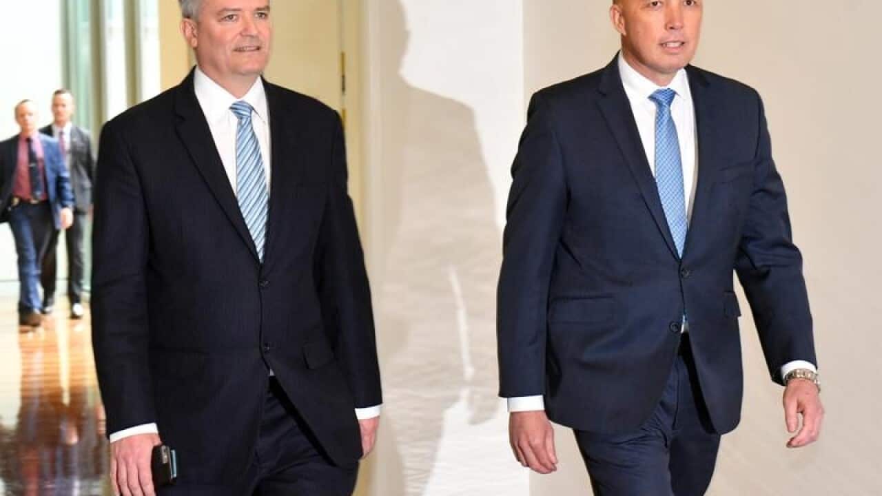 Senator Matthias Cormann and Minister for Home Affairs Peter Dutton