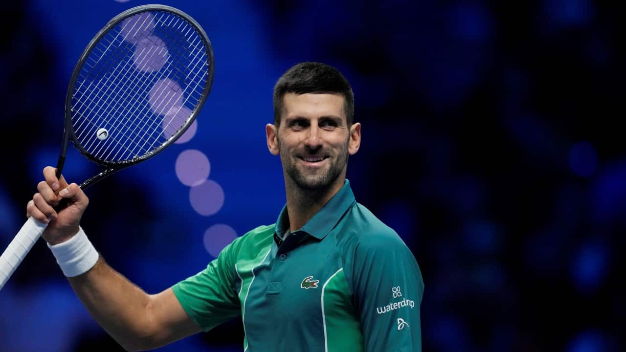 Serbia's Novak Djokovic celebrates after winning a tennis match against Denmark's Holger Rune, at the ATP World Tour Finals in Turin, Italy