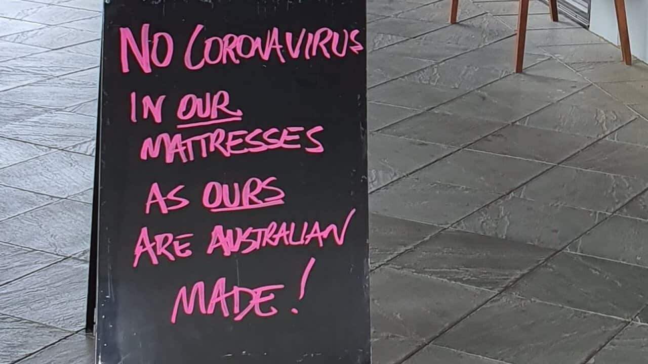 The sign was posted outside the Albury Harvey Norman store. 