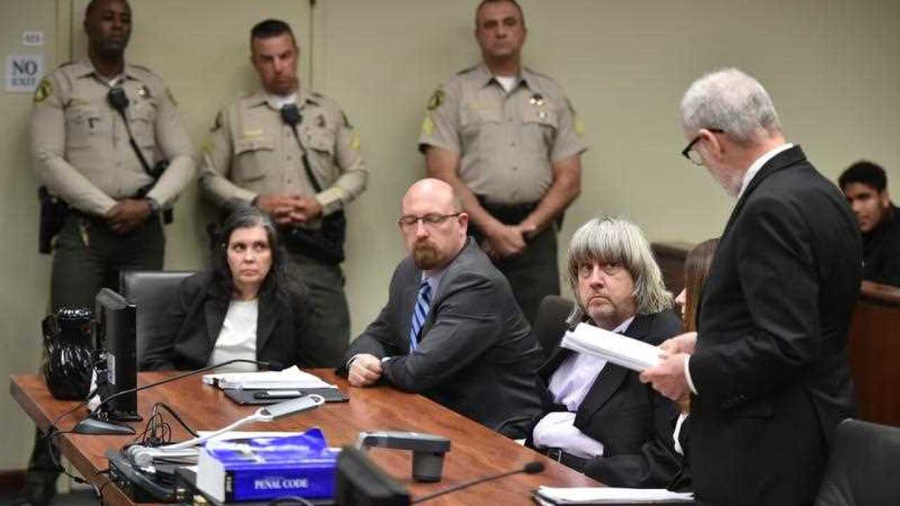 Louise Turpin (L) and attorney Jeff Moore (C) David Turpin (2-R) appear in court for arraignment on charges against the two in relation to their 13 malnourished children found chained in their home in Riverside, California, USA, 18 January 2018.
