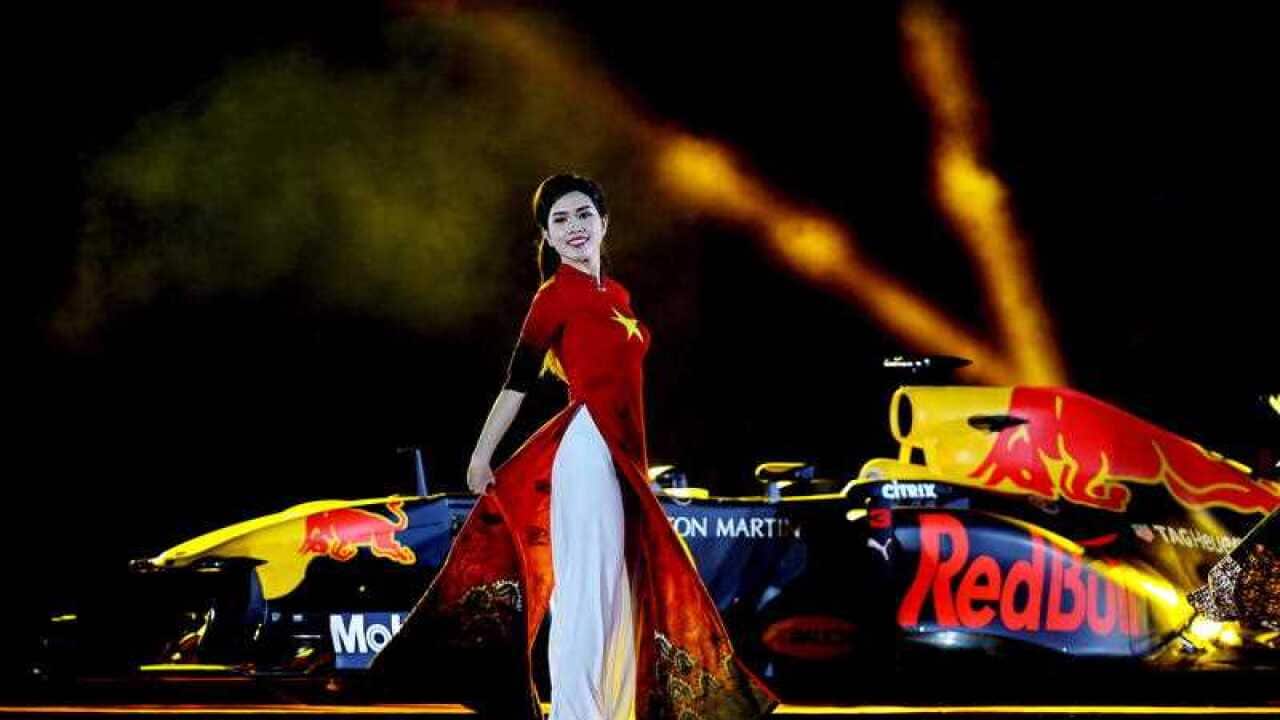A Vietnamese model wearing a traditional dress during a ceremony in Hanoi.