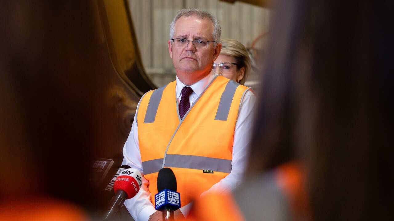 Prime Minister Scott Morrison speaks at a press conference during a visit to the BHP FutureFit Academy in Perth, Wednesday, April 14, 2021. (AAP Image/Richard Wainwright) NO ARCHIVING