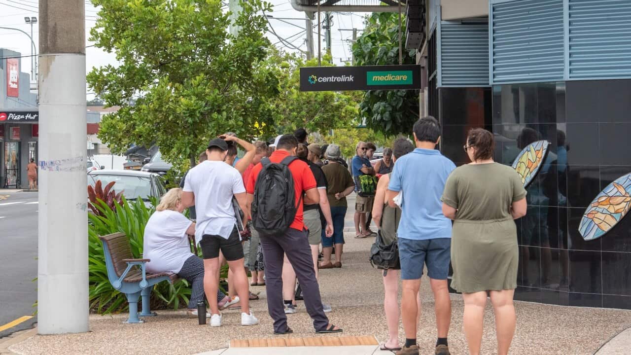 Australians queue at Centrelink during the COVID-19 pandemic