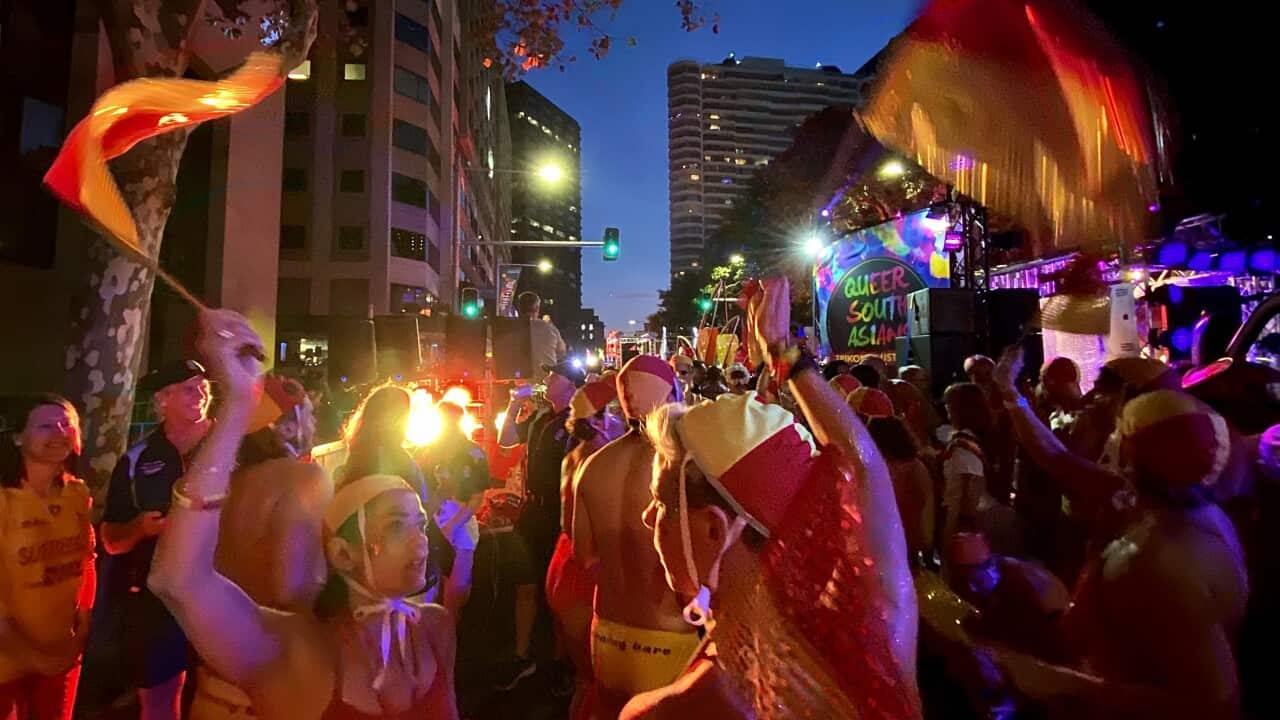 In a photo taken on iPhone 11 Pro, participants take part in the 42nd annual Gay and Lesbian Mardi Gras parade in Sydney, Saturday, February 29, 2020. (AAP Image/Steven Saphore) NO ARCHIVING