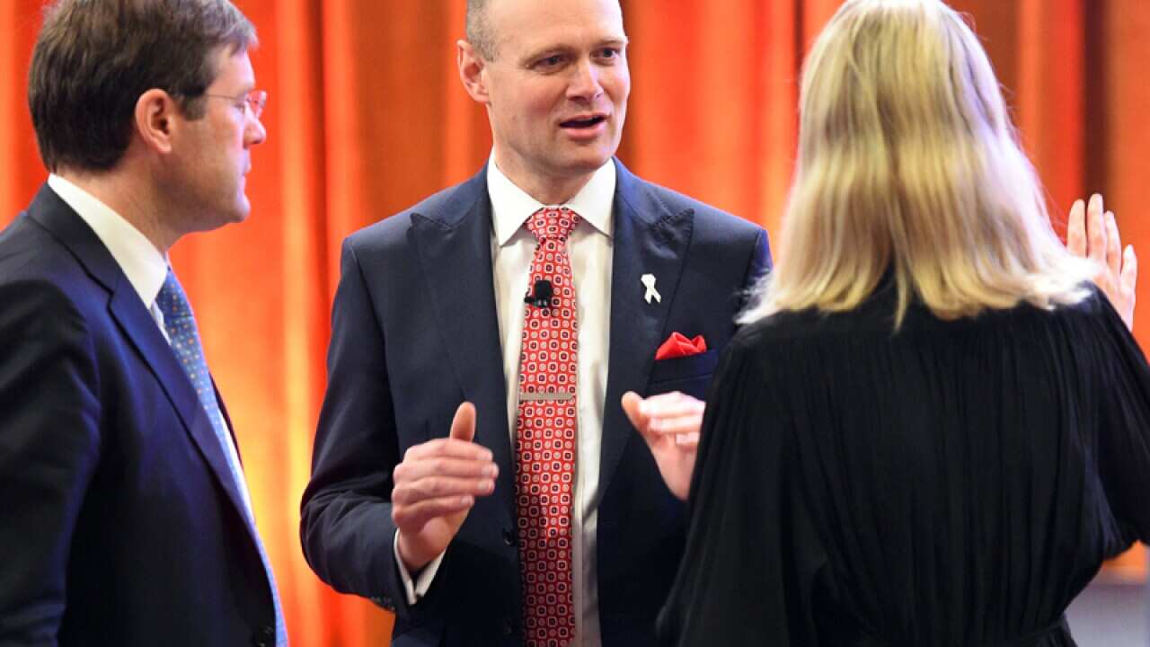 Myer CEO Richard Umbers (C) at the company's AGM