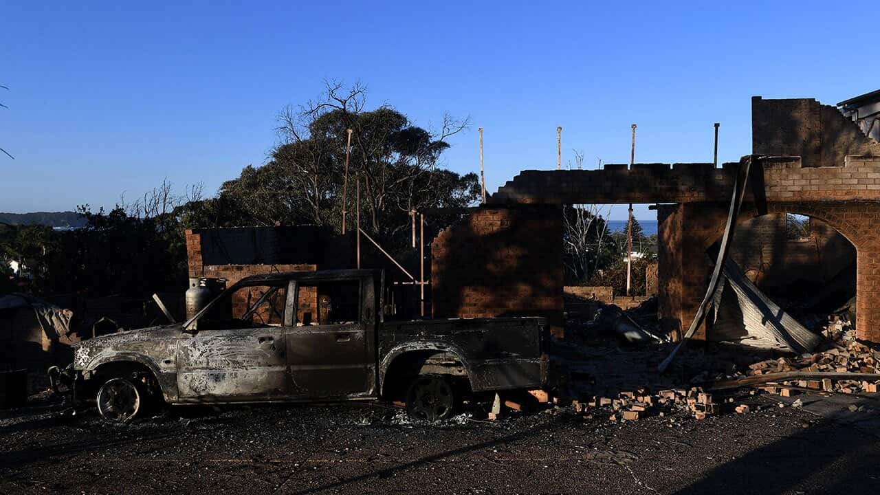 Cops drove past and yelled 'Evacuate!': Tathra residents had trouble receiving bushfire warnings.