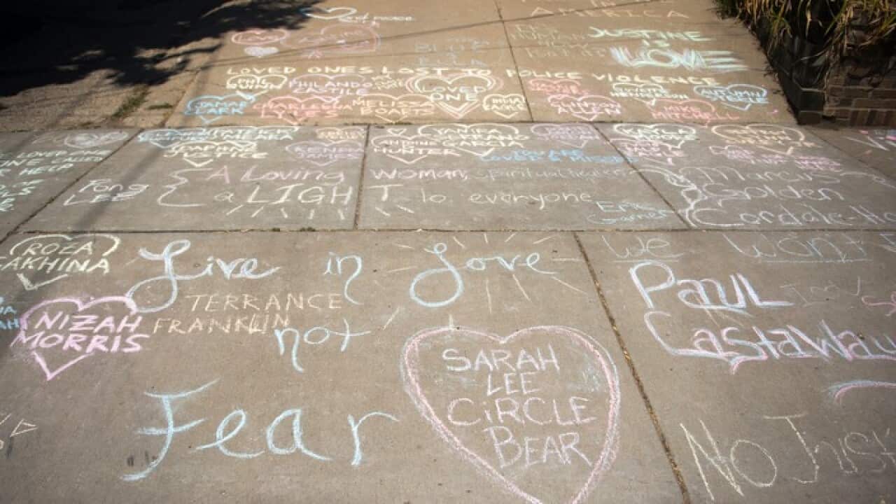 Messages are left at a makeshift memorial near the alley were Justine Ruszczyk was shot and killed by police in Minneapolis, MN., USA, 17 July 2017. EPA/CRAIG LASSIG