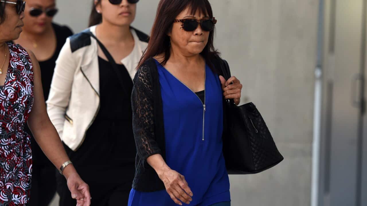 Merzabeth Tagpuno (R), the mother of New Zealand woman Warriena Wright