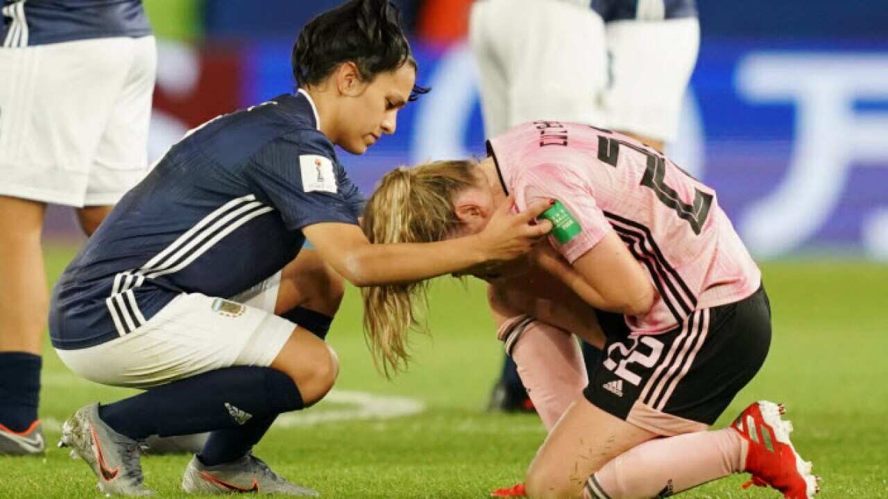 Argentina's Eliana Stabile comforts Scotland's Erin Cuthbert after a tie boots Scotland from the Women's World Cup (Getty Images)