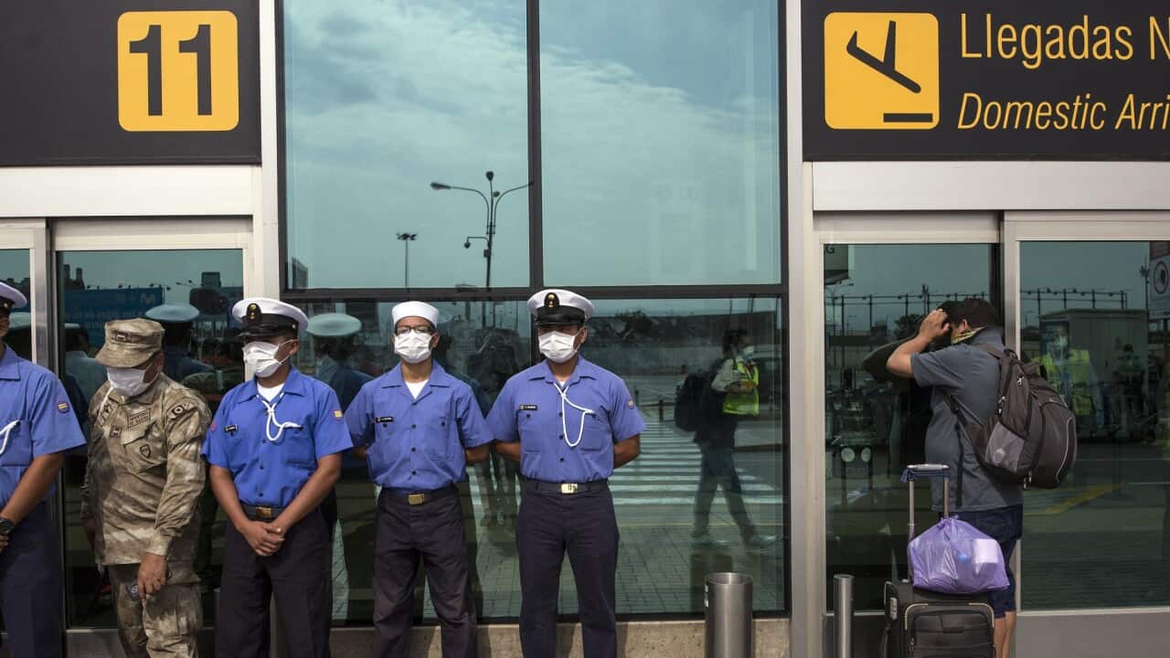 Marines on guard at a semi-closed airport, in Lima, Peru