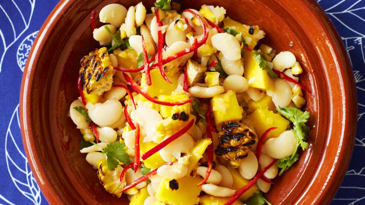 Chargrilled corn and lima bean salad with mango and mojo criollo SBS Food