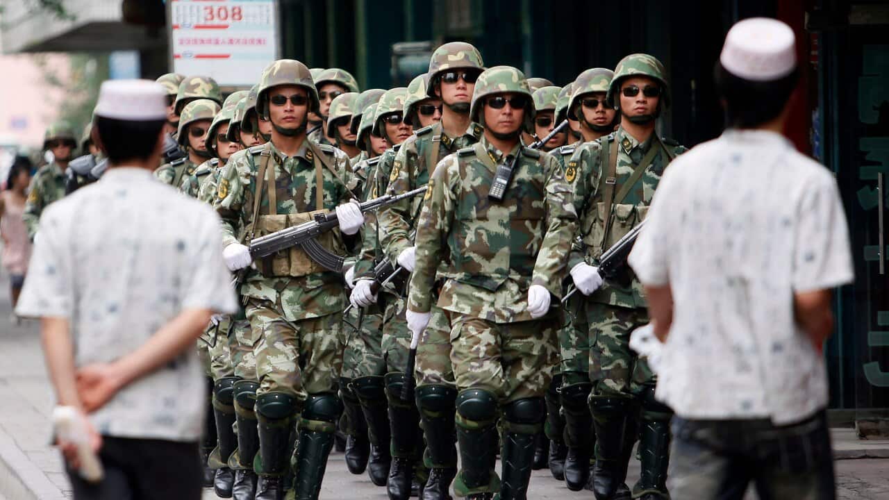 Chinese paramilitary police patrol in the aftermath of riots in Urumqi, in 2009. The riots set in motion the harsh measures and detainment of Uighurs.