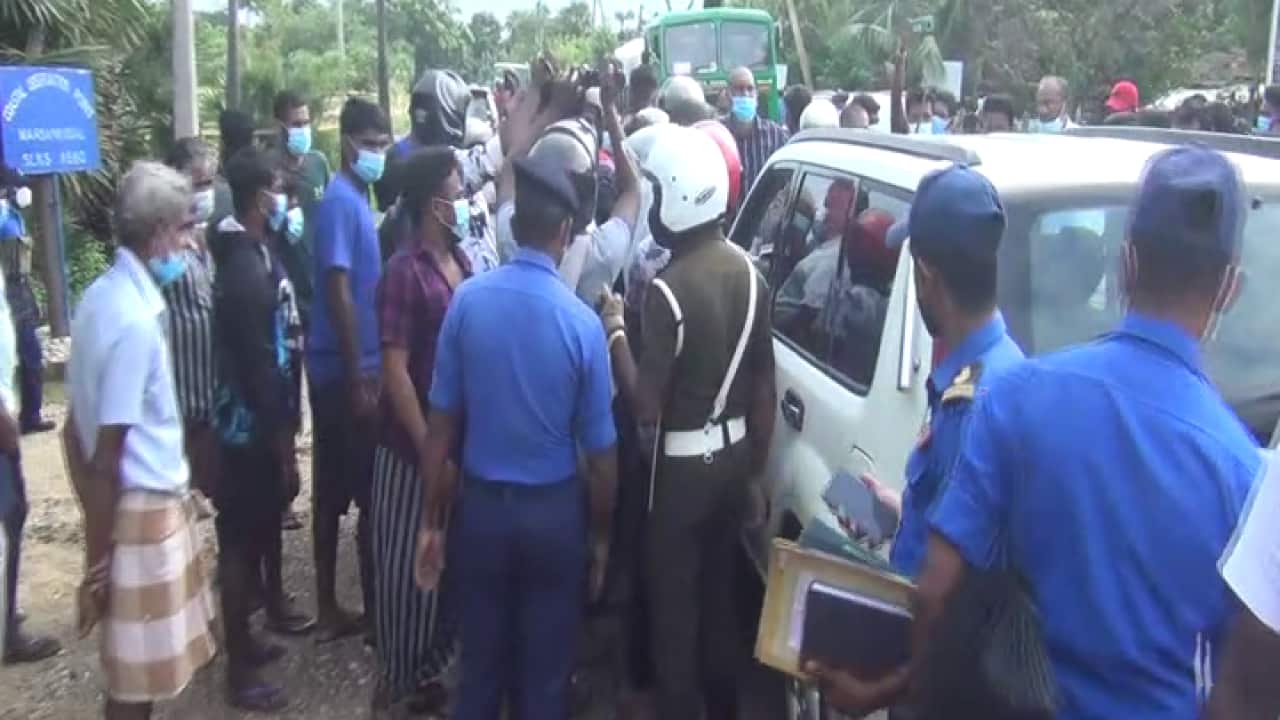 People in Sri Lanka protesting military occupation