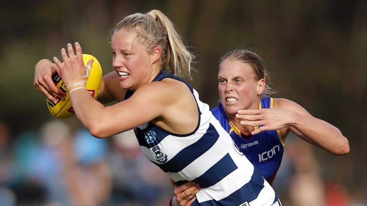 Geelongs' Jordan Ivey holds the ball.