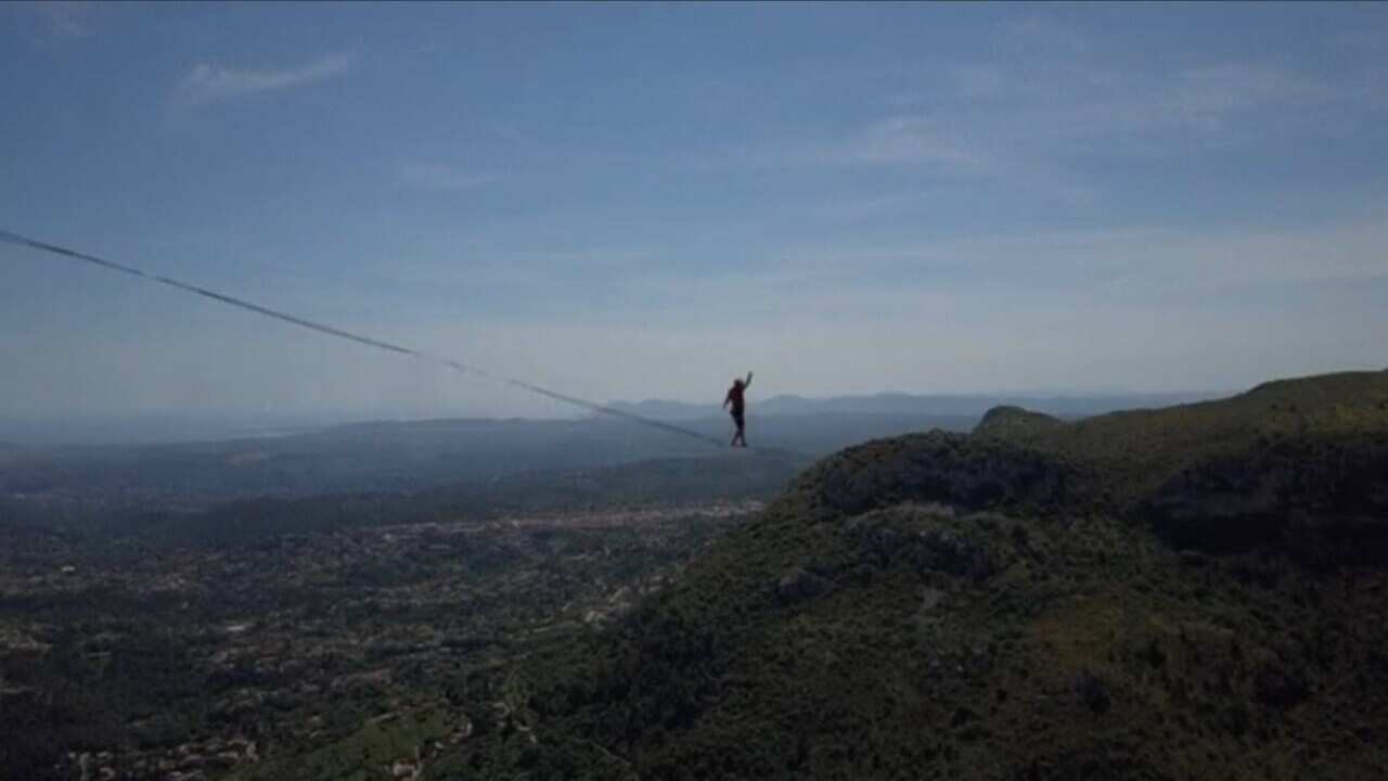 27-year-old, Friedrich Kuhne, attempts to beat the highline world record.