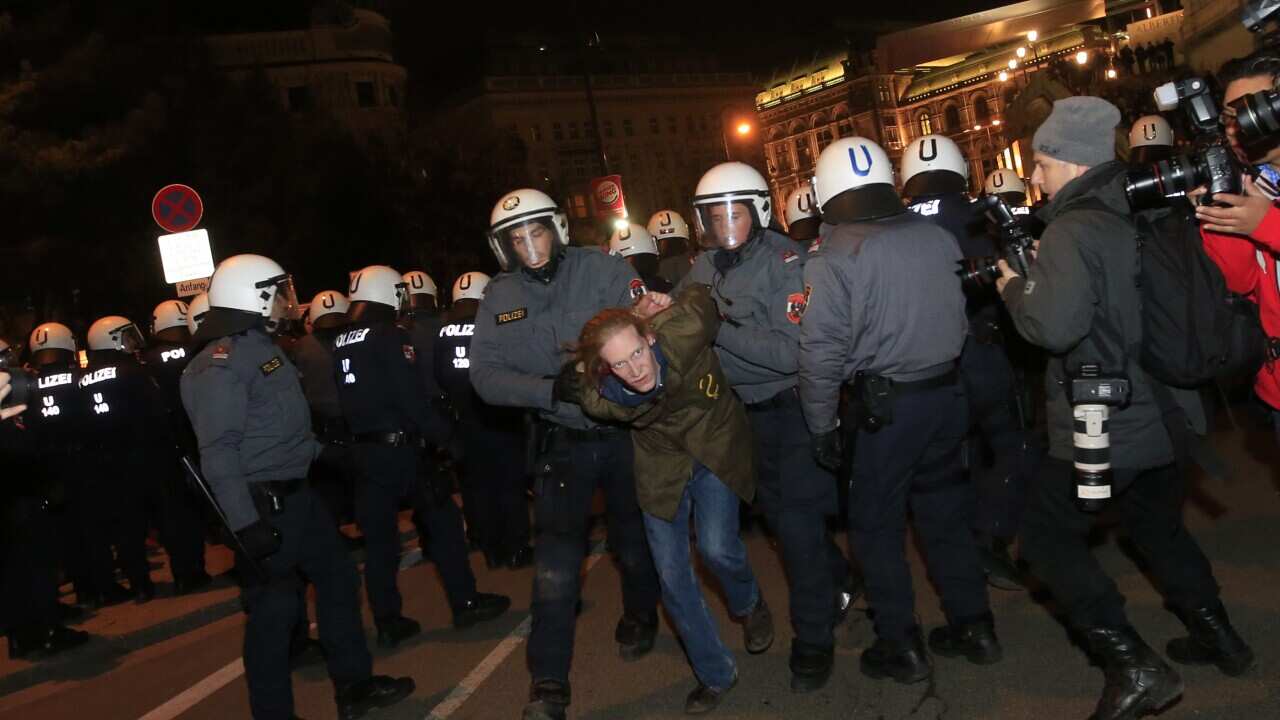 A demonstrator is arrested by policemen as he protests against the 2013 Wiener Akademikerball getty.jpg