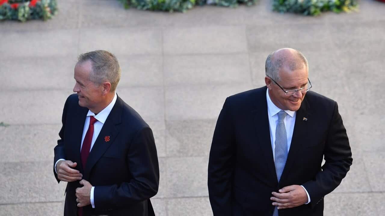 Leader of the Opposition Bill Shorten and Prime Minister Scott Morrison at the Last Post Ceremony at the Australian War Memorial in Canberra, Monday, February 11, 2019. (AAP Image/Mick Tsikas) NO ARCHIVING