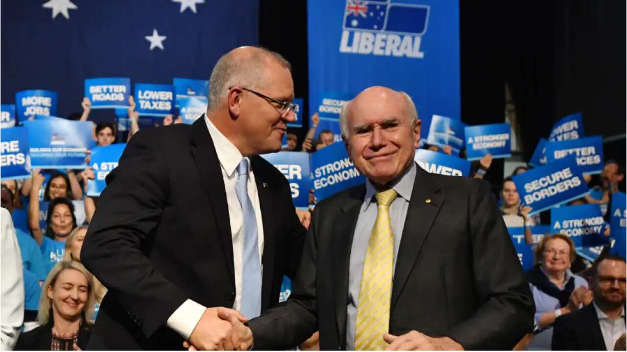 Prime Minister Scott Morrison and former prime minister John Howard at a campaign rally at Sydney Olympic Park in Sydney,